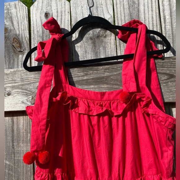 TCEC Red Sleeveless Ruffle Dress With Pom Pom Shoulder Ties - Picture 4 of 9
